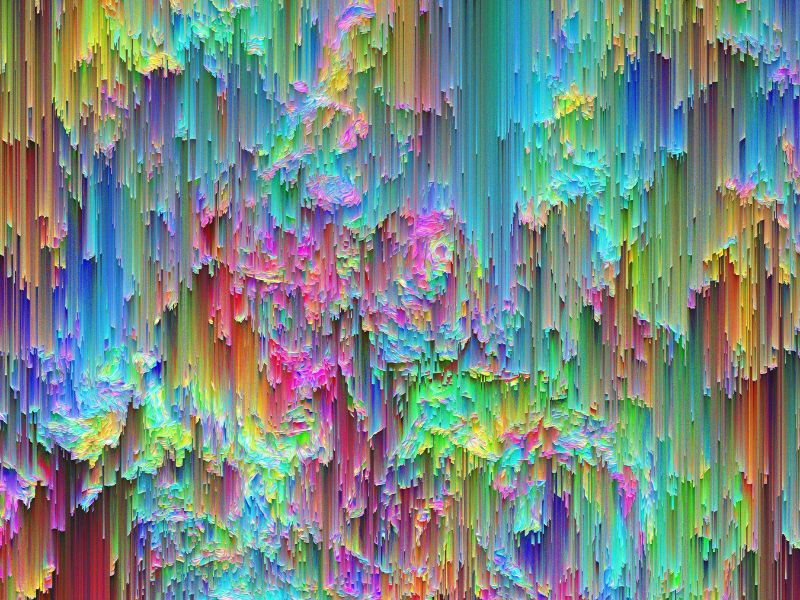 Abstract image of many bright colours dripping in a waterfall