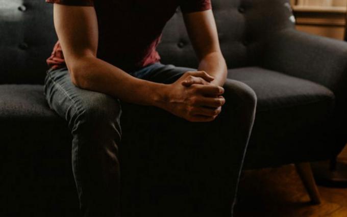 a man sitting on a couch